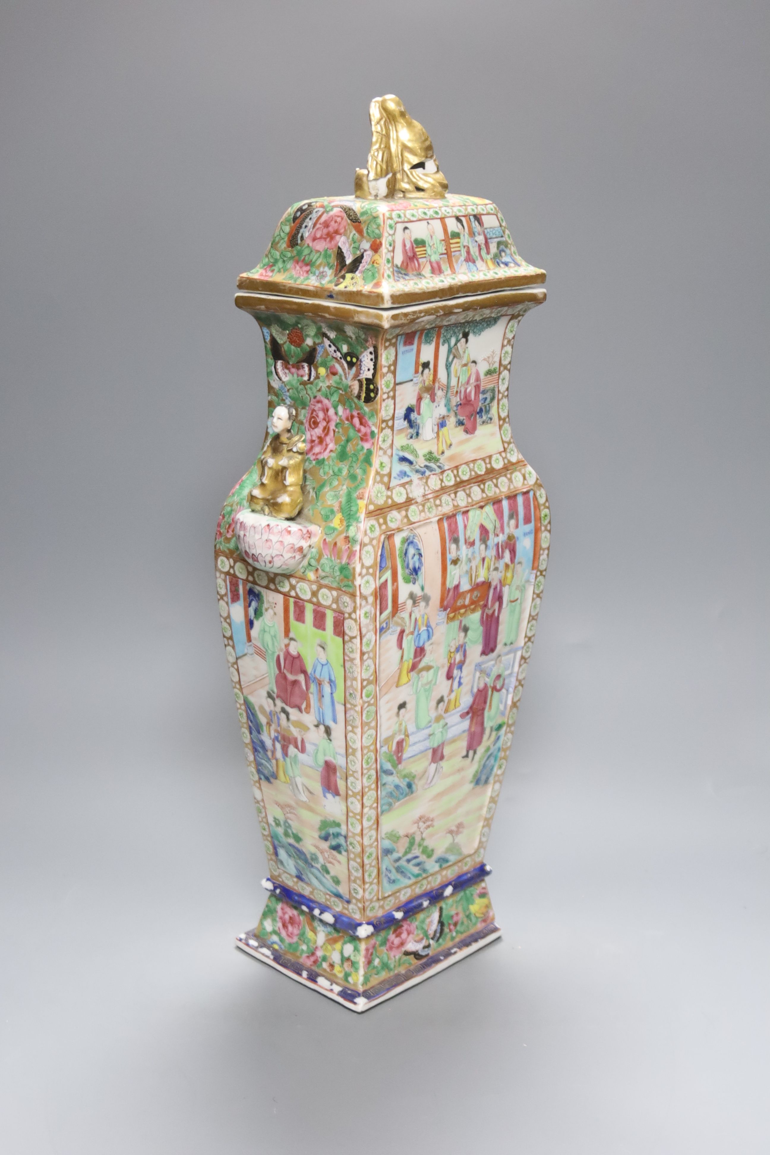 A large Chinese famille rose Canton decorated vase and cover, Daoguang period, height 53cm (a.f)